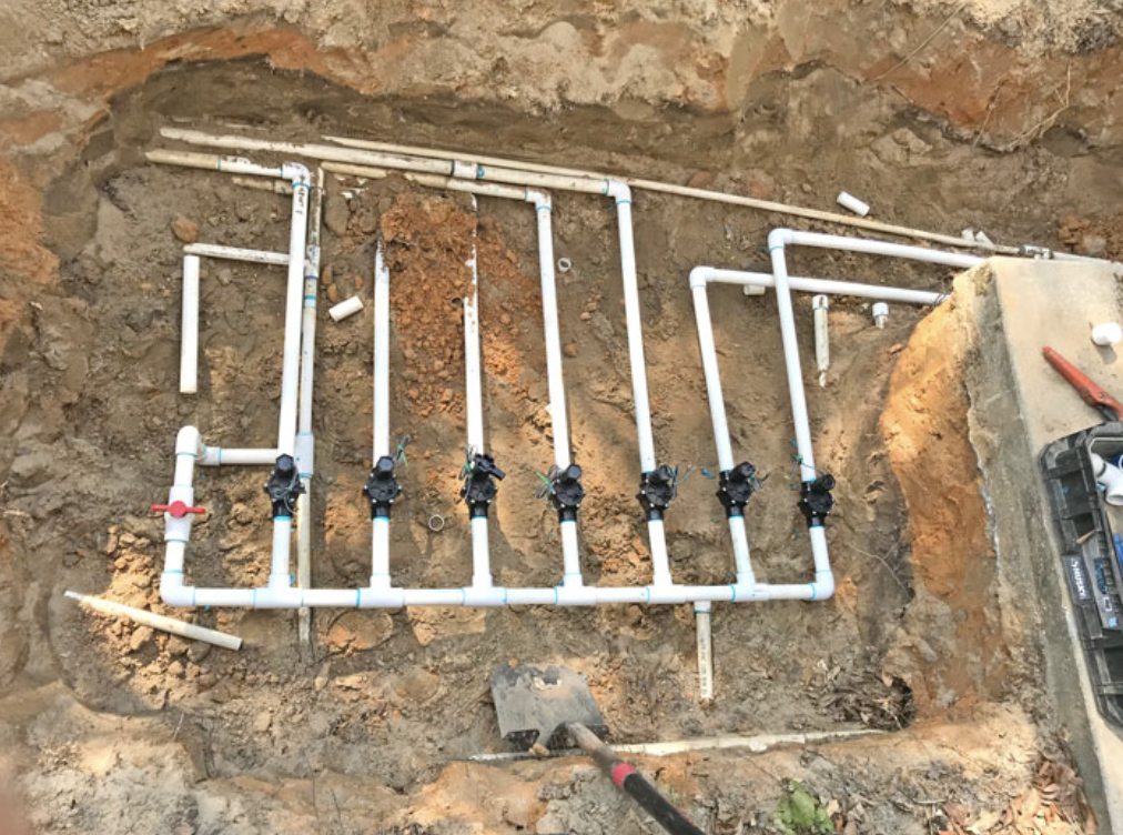 Landscaping contractor in Omaha installing retaining walls and hardscapes