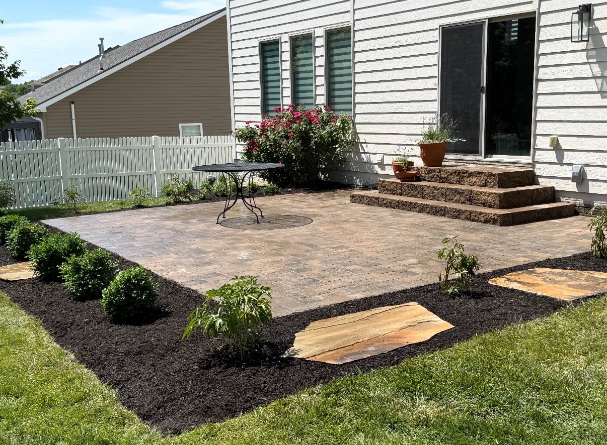 Paver patio with steps and new landscape beds